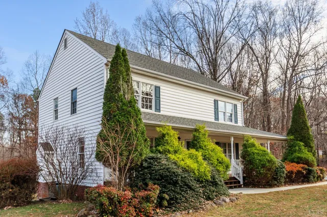 a view of balcony with wooden floor