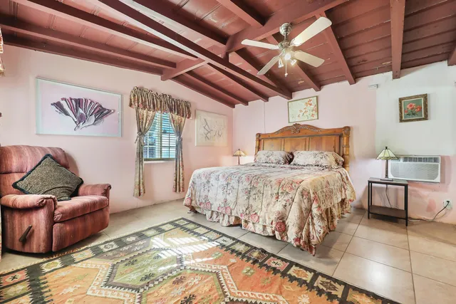 a view of a chairs and table in a patio