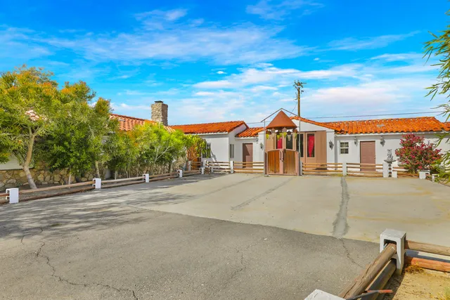 a bathroom with a shower curtain and a bathtub