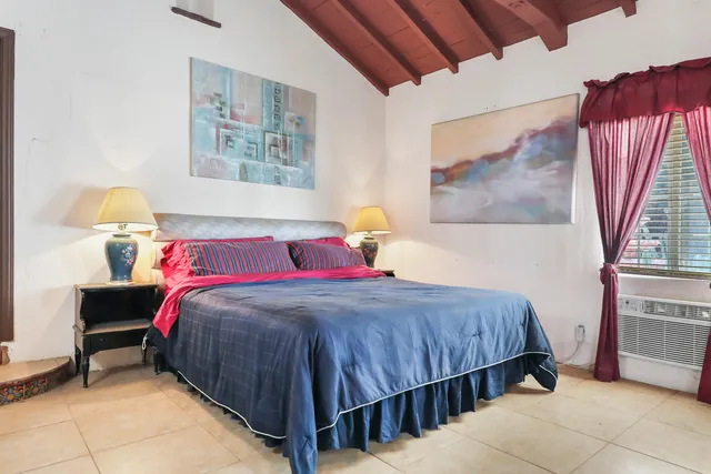 a living room with furniture fireplace and a flat screen tv