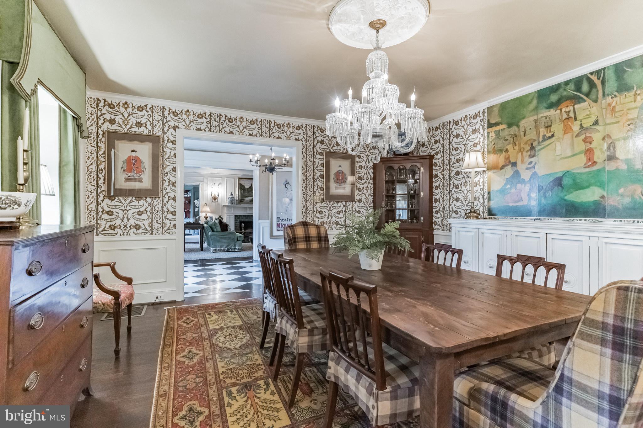 1413 Pepper Road Jenkintown, PA 19046 - Photo 11 of 65 a view of a dining room with furniture a chandelier and wooden floor
