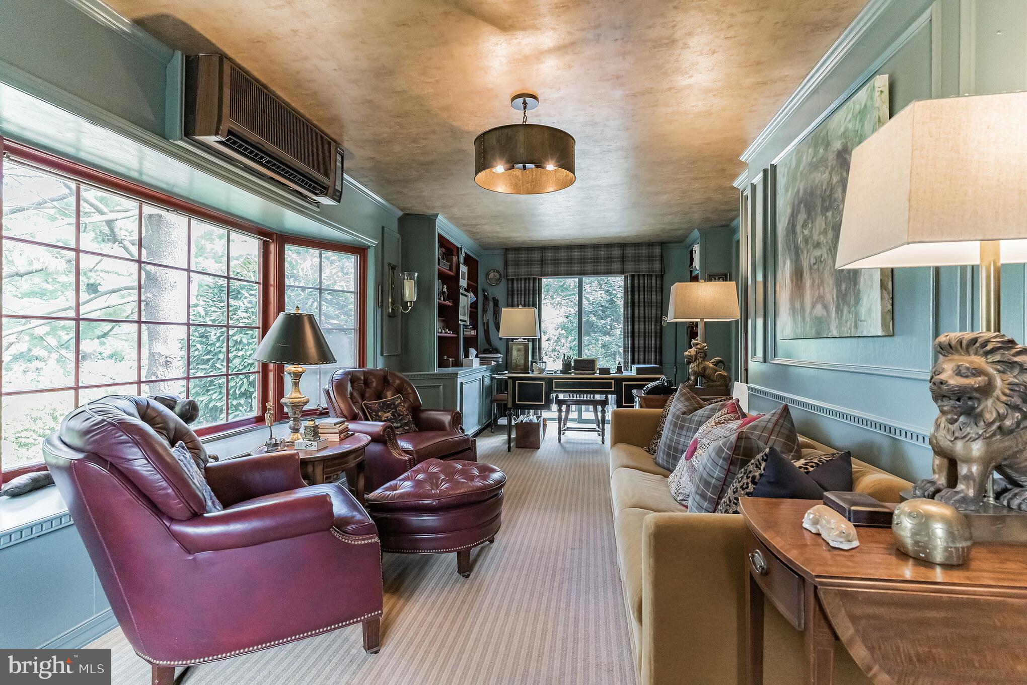 1413 Pepper Road Jenkintown, PA 19046 - Photo 21 of 65 a living room with furniture a lamp and a large window
