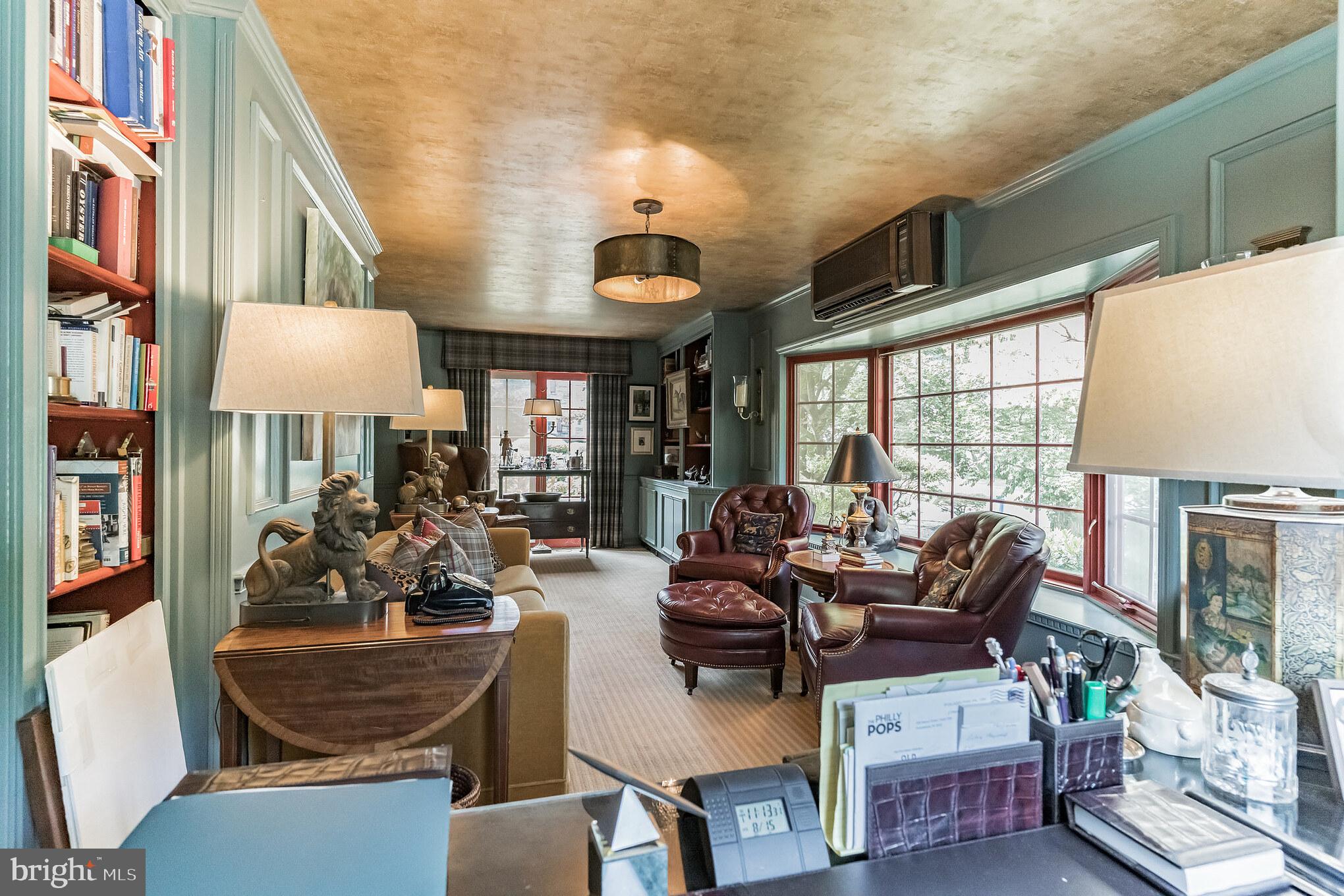 1413 Pepper Road Jenkintown, PA 19046 - Photo 22 of 65 a living room with furniture a lamp and a large window