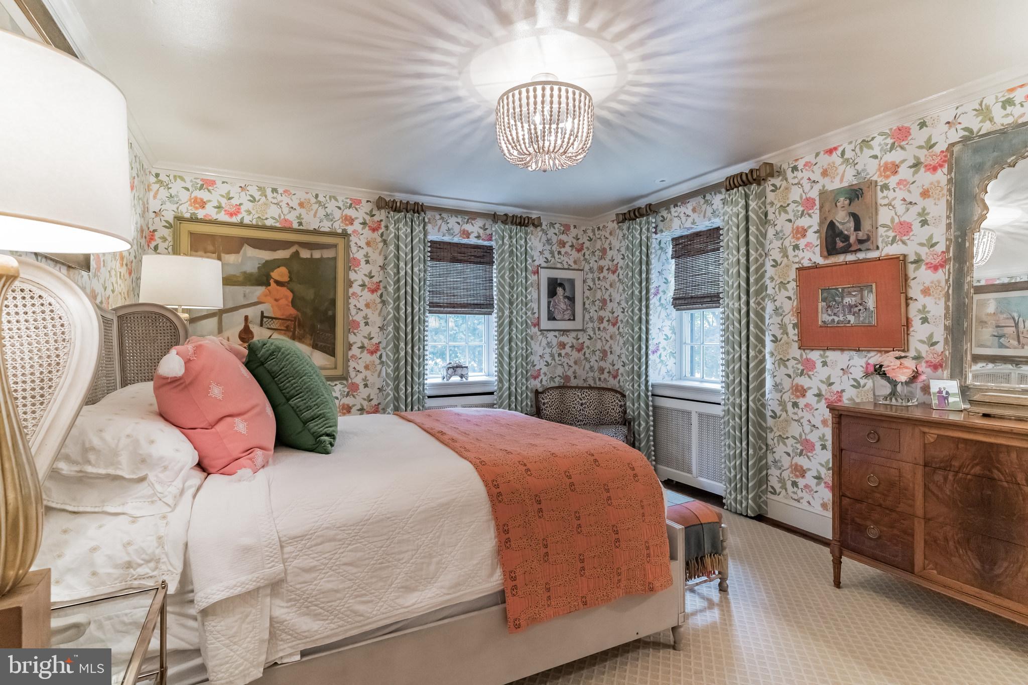 1413 Pepper Road Jenkintown, PA 19046 - Photo 33 of 65 a bedroom with a large bed and a chandelier