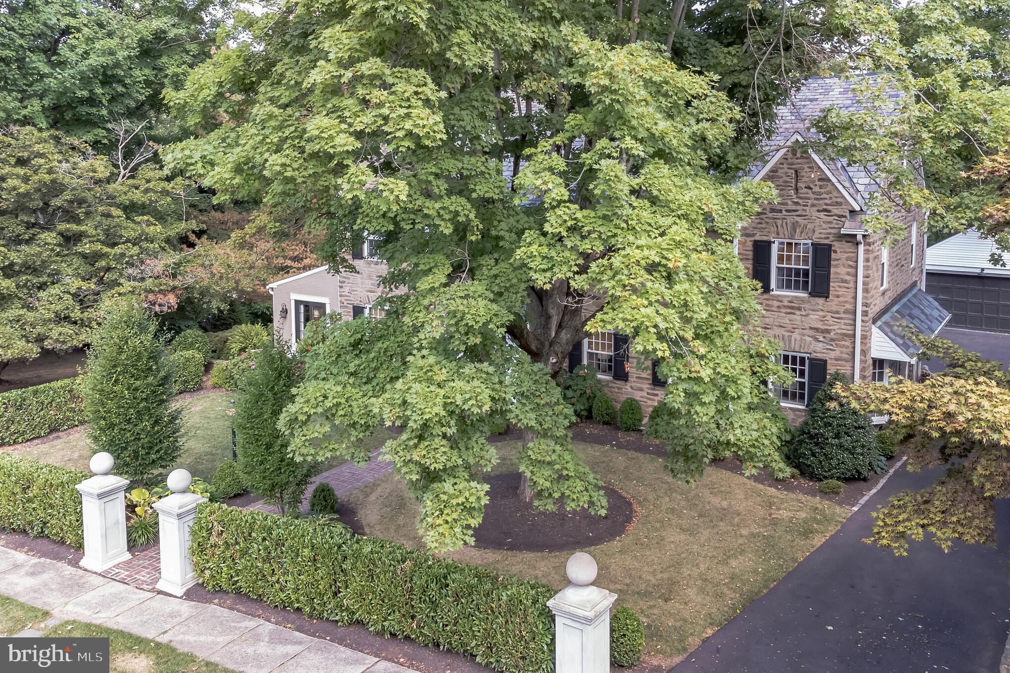 1413 Pepper Road Jenkintown, PA 19046 - Photo 48 of 65 a front view of a house with garden