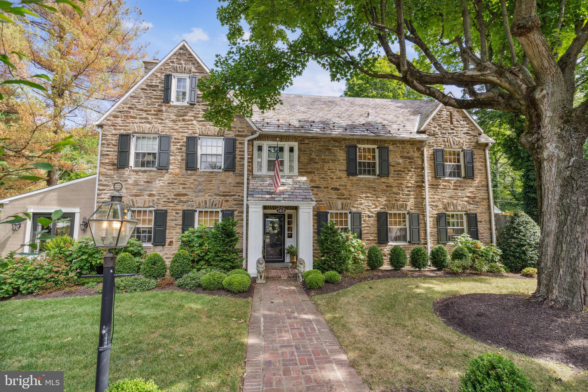 1413 Pepper Road Jenkintown, PA 19046 - Photo 57 of 65 a front view of a house with garden