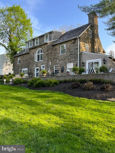1413 Pepper Road Jenkintown, PA 19046 - Photo 61 of 65 a front view of house with yard and outdoor seating