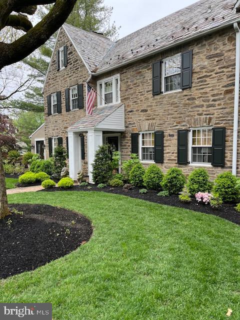1413 Pepper Road Jenkintown, PA 19046 - Photo 64 of 65 a front view of a house with garden