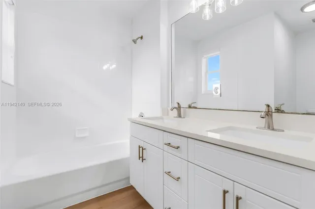 a bathroom with a shower and a toilet