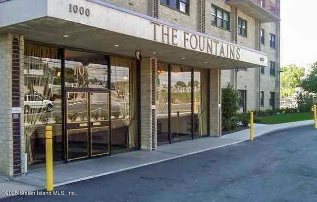 a view of a building with a large window