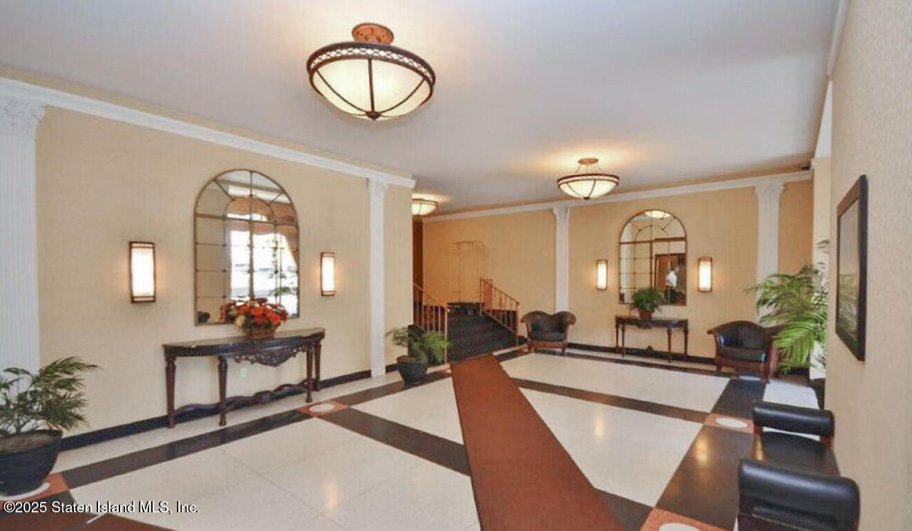 1000 Clove Road, Unit LLC Staten Island, NY 10301 - Photo 3 of 3 a living room with furniture