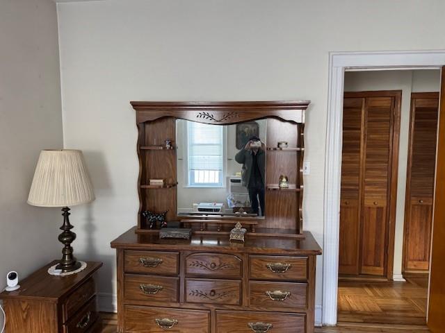 355 85th Street Brooklyn, NY 11209 - Photo 7 of 15 a room with a table and a mirror