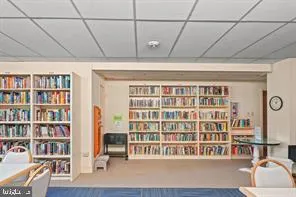 a view of a livingroom with furniture and a table