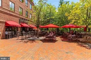 a front view of a building with many windows