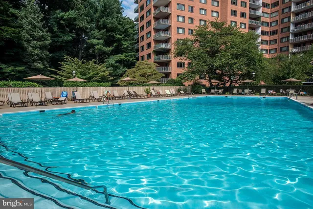 a view of a swimming pool and outdoor space