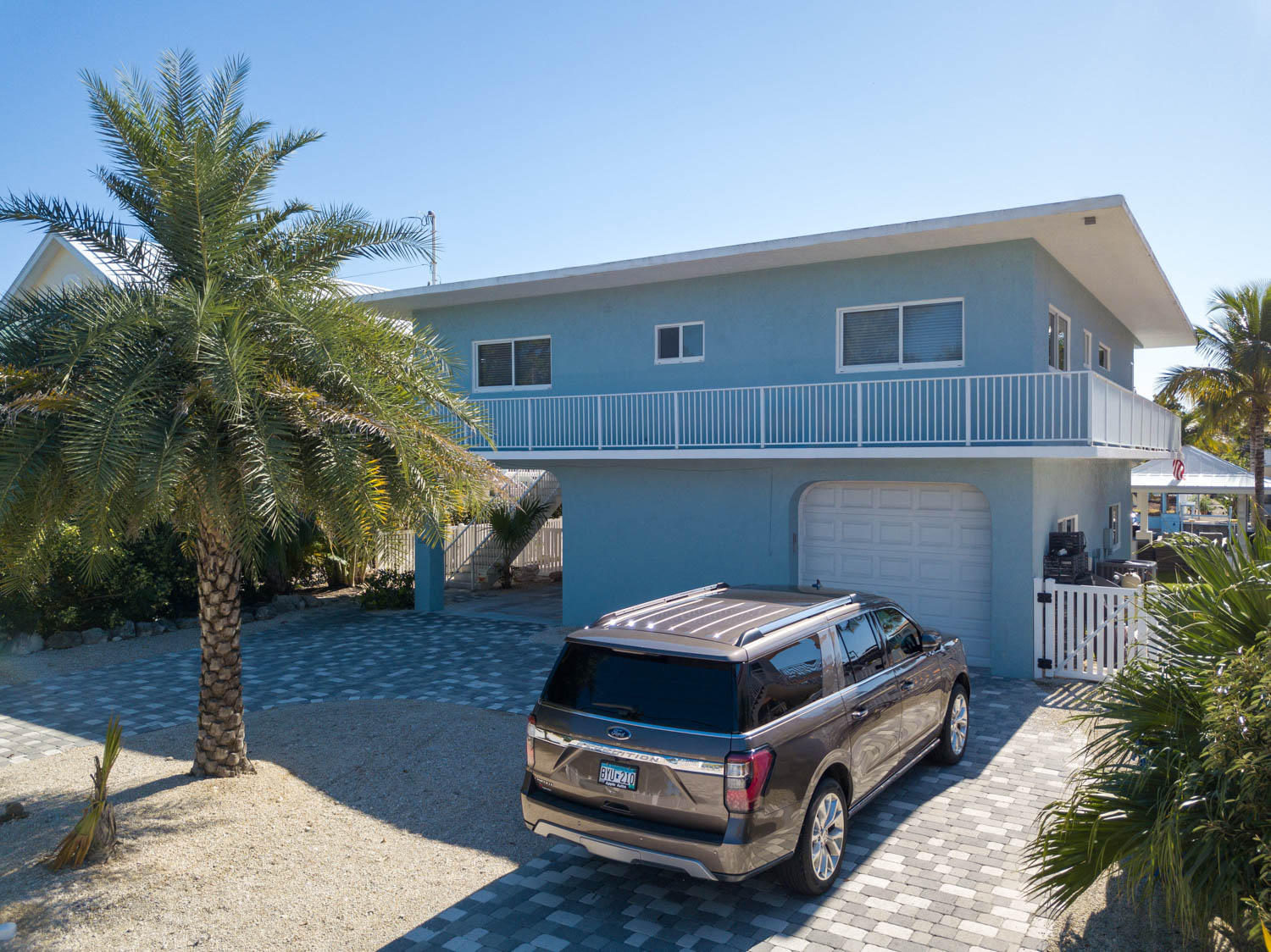 152 Bessie Road Tavernier, FL 33070 - Photo 5 of 36 Front Paver Driveway & Garage