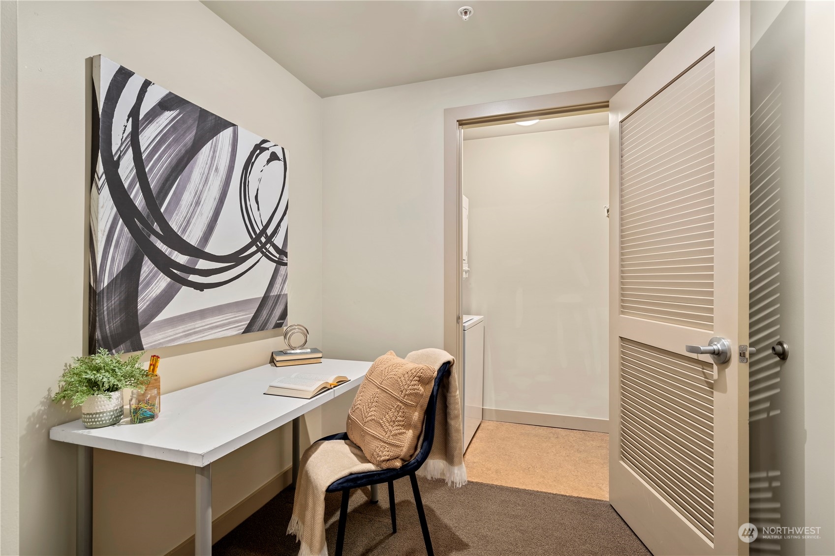 910 Lenora Street, Unit S705 Seattle, WA 98121 - Photo 3 of 28 a view of a room with furniture and a window