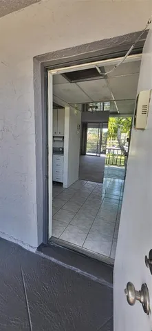 a view of a yard with an outdoor space