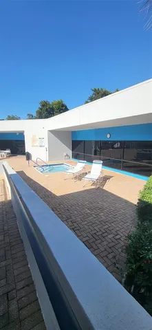 a view of an outdoor space pool patio and yard