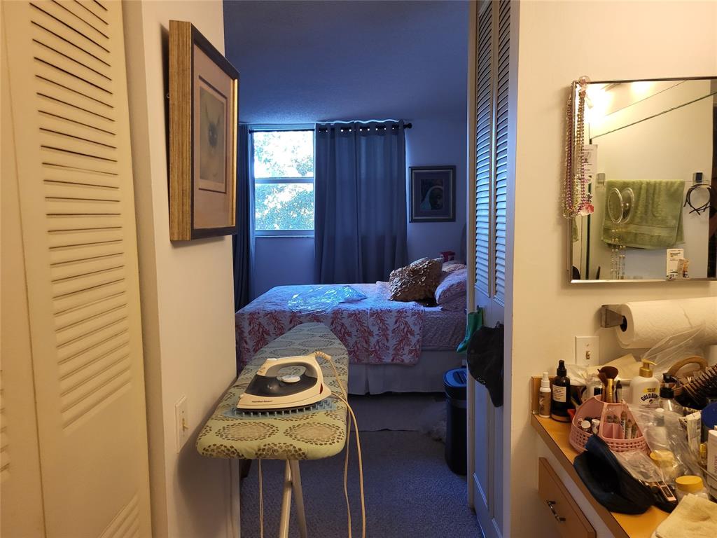 9070 Lime Bay Boulevard, Unit 309 Tamarac, FL 33321 - Photo 6 of 16 a living room with furniture and a window