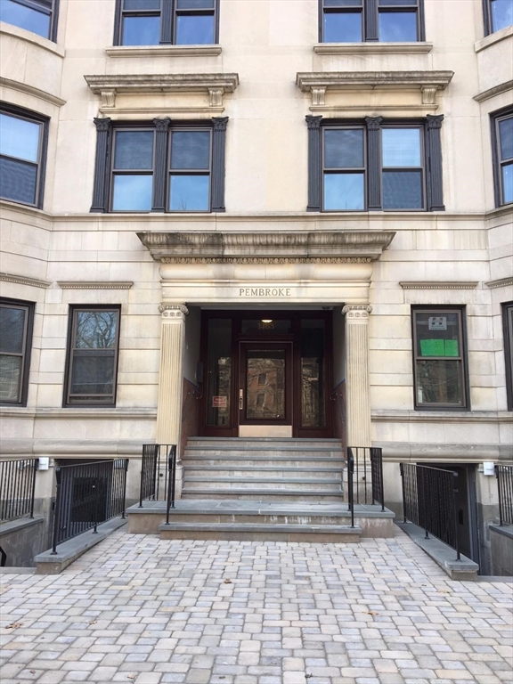 1463 Beacon Street, Unit 32 Brookline, MA 02446 - Photo 2 of 10 a front view of a house