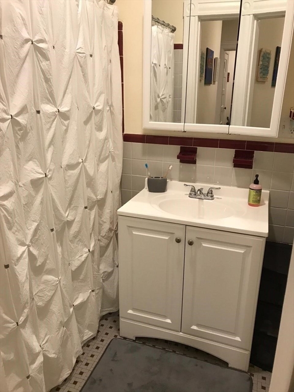 1463 Beacon Street, Unit 32 Brookline, MA 02446 - Photo 3 of 10 a utility room with dryer and washer