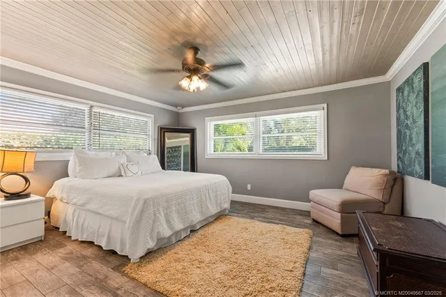 a bathroom with a sink a mirror and shower