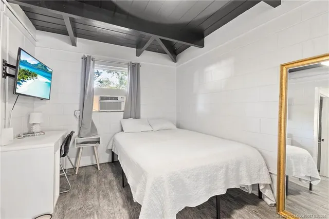 swimming pool view with a garden space