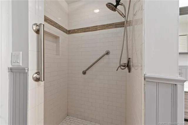 a view of a swimming pool with chairs