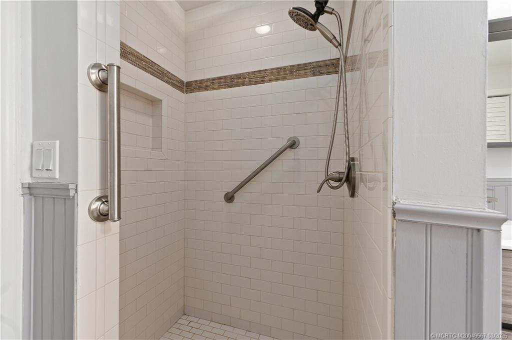 530 South Manor Drive Stuart, FL 34994 - Photo 42 of 55 a bathroom with a shower