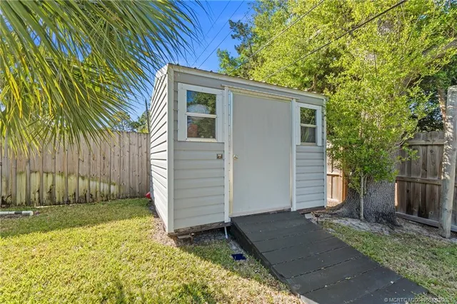 an aerial view of a house with a garden