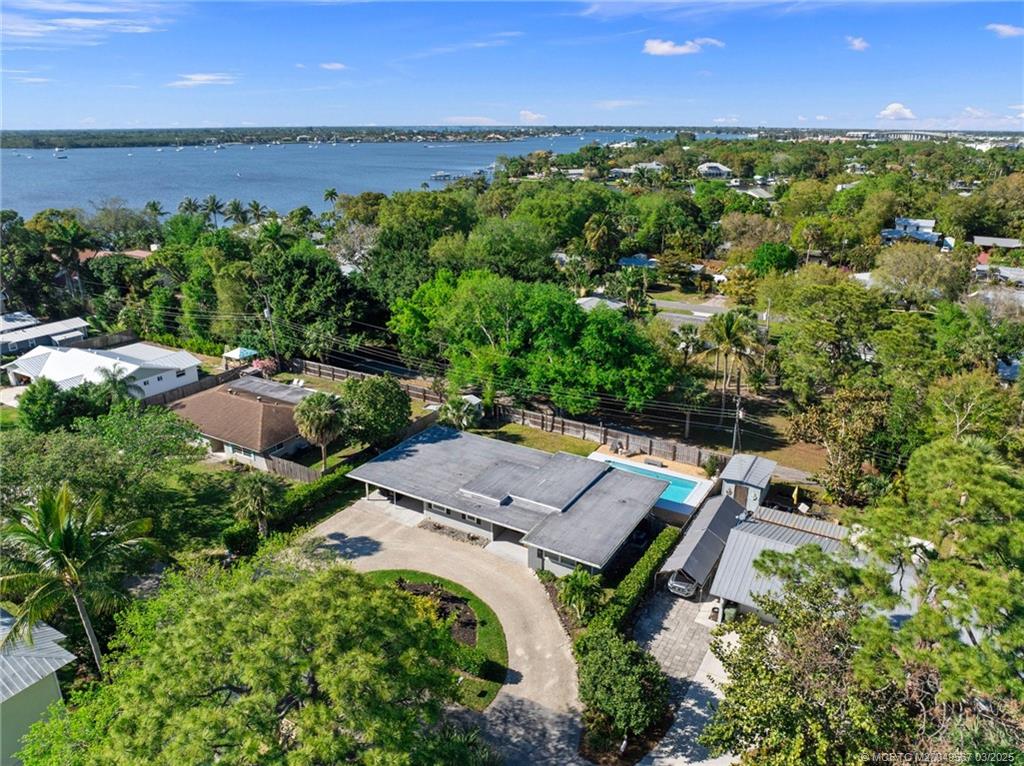 530 South Manor Drive Stuart, FL 34994 - Photo 50 of 55 an aerial view of a house with a yard