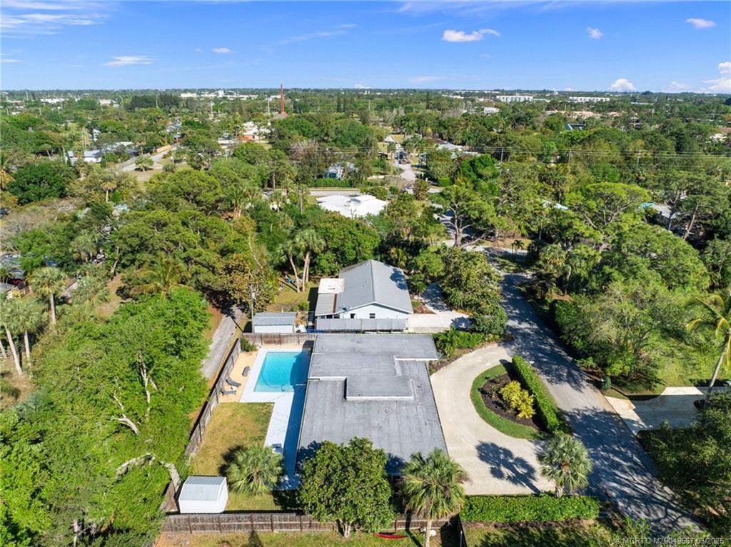 530 South Manor Drive Stuart, FL 34994 - Photo 51 of 55 an aerial view of a house with a garden