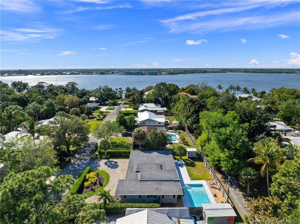 530 South Manor Drive Stuart, FL 34994 - Photo 55 of 55 an aerial view of a house with a yard