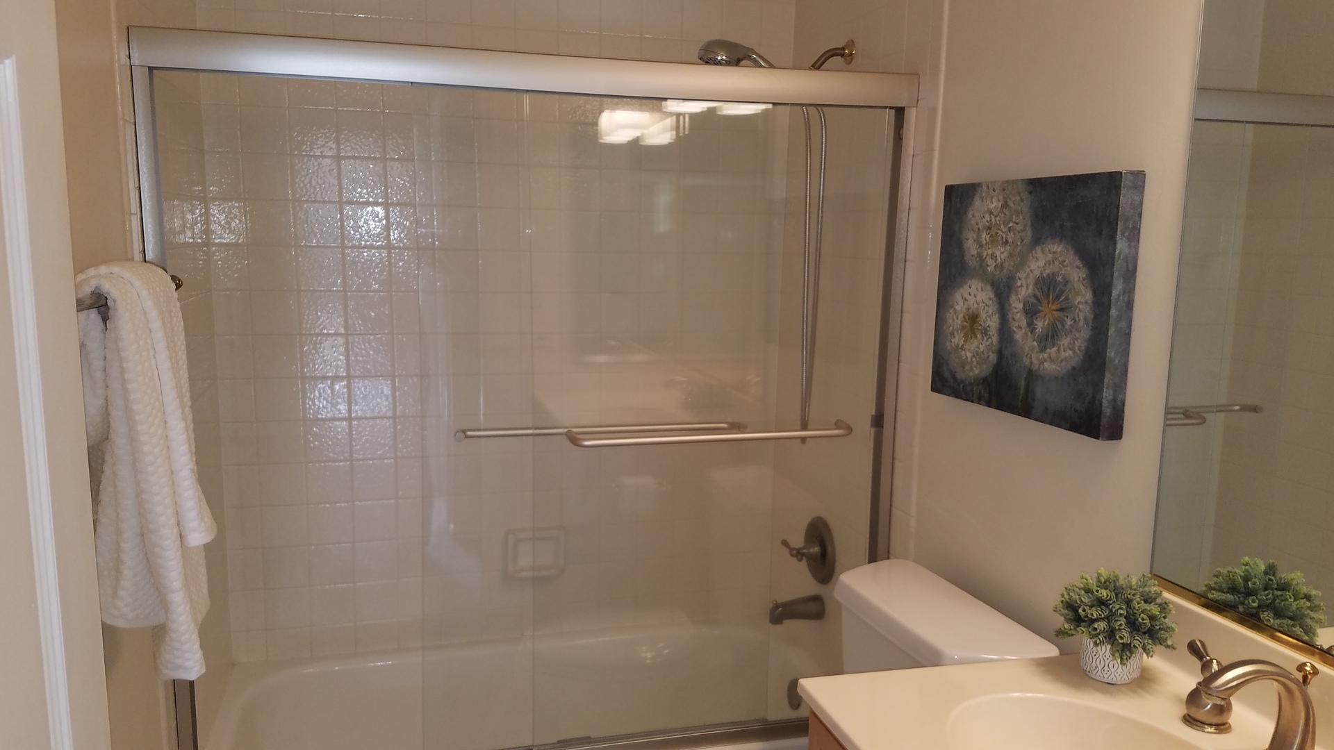 801 Oak Hill Road, Unit 471 Lake Barrington, IL 60010 - Photo 12 of 14 a bathroom with a shower and a sink
