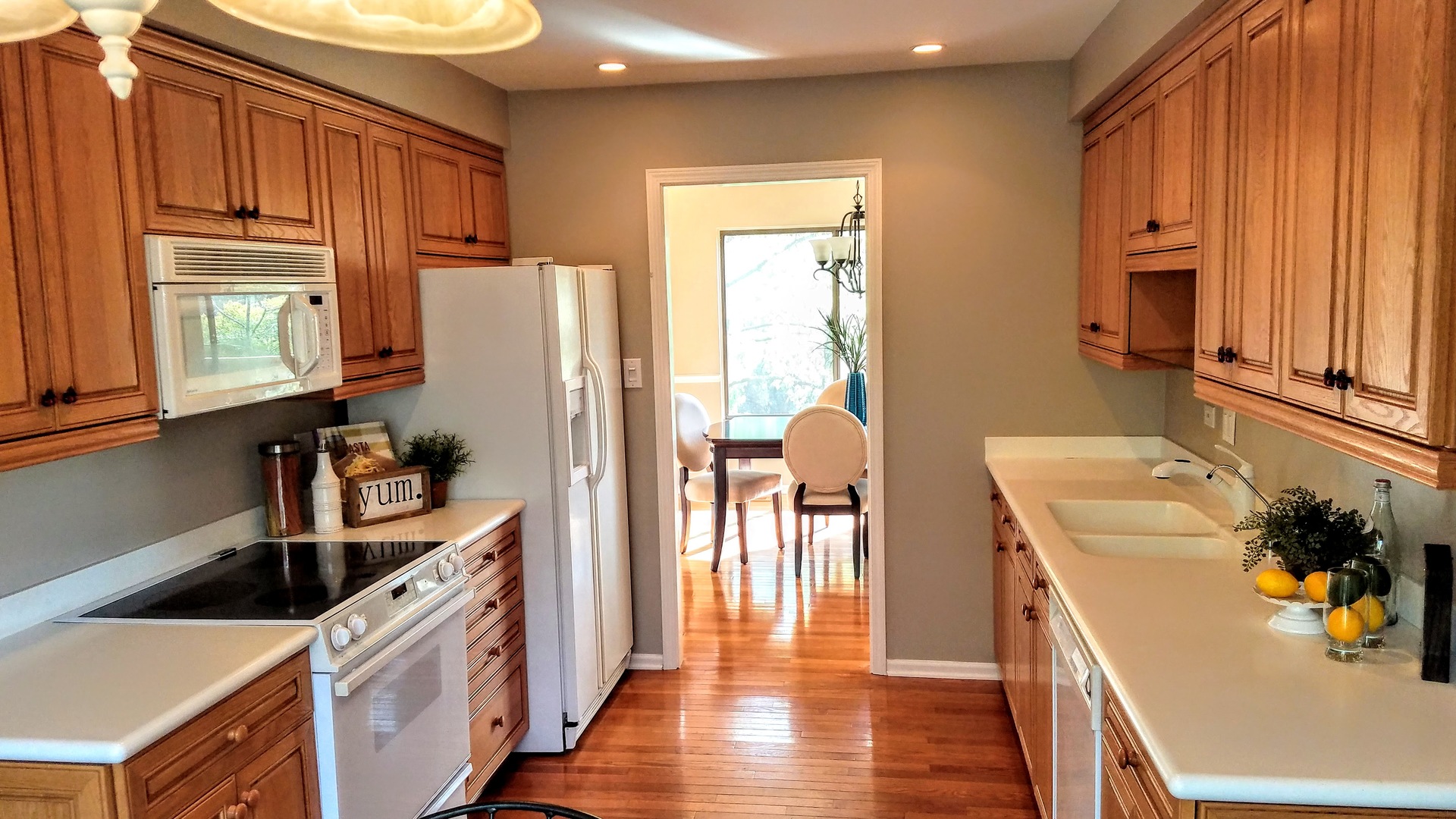 801 Oak Hill Road, Unit 471 Lake Barrington, IL 60010 - Photo 7 of 14 a kitchen with stainless steel appliances granite countertop a refrigerator and a sink