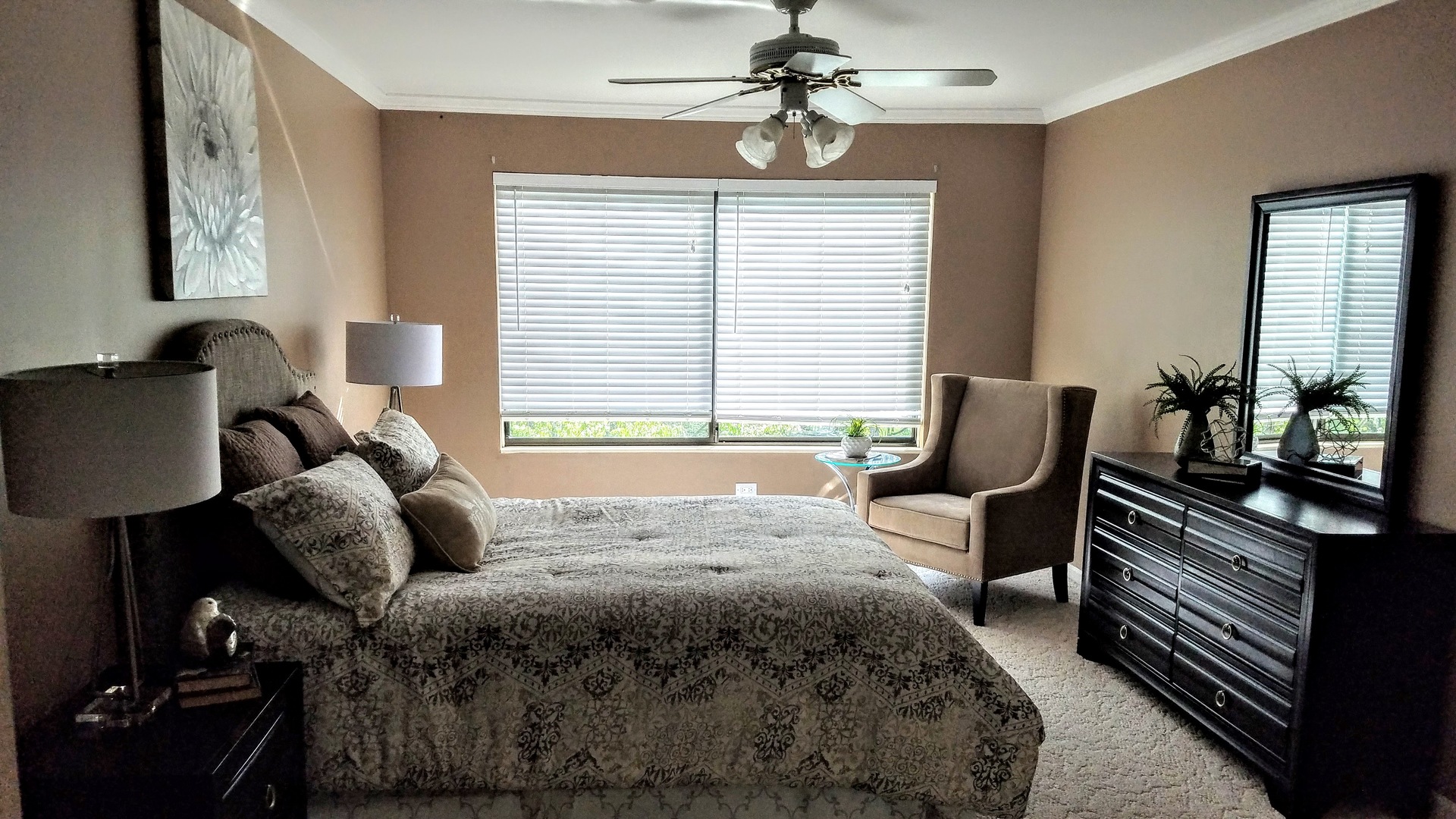 801 Oak Hill Road, Unit 471 Lake Barrington, IL 60010 - Photo 9 of 14 a bedroom with a bed and wooden floor