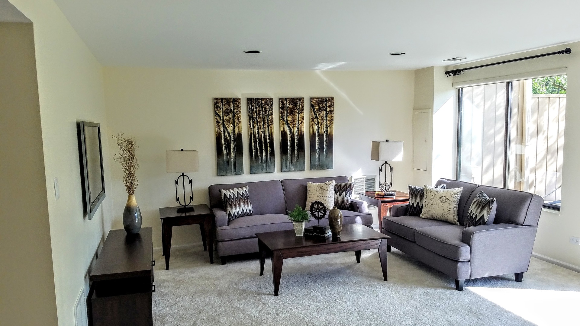 801 Oak Hill Road, Unit 471 Lake Barrington, IL 60010 - Photo 10 of 14 a living room with furniture and a large window
