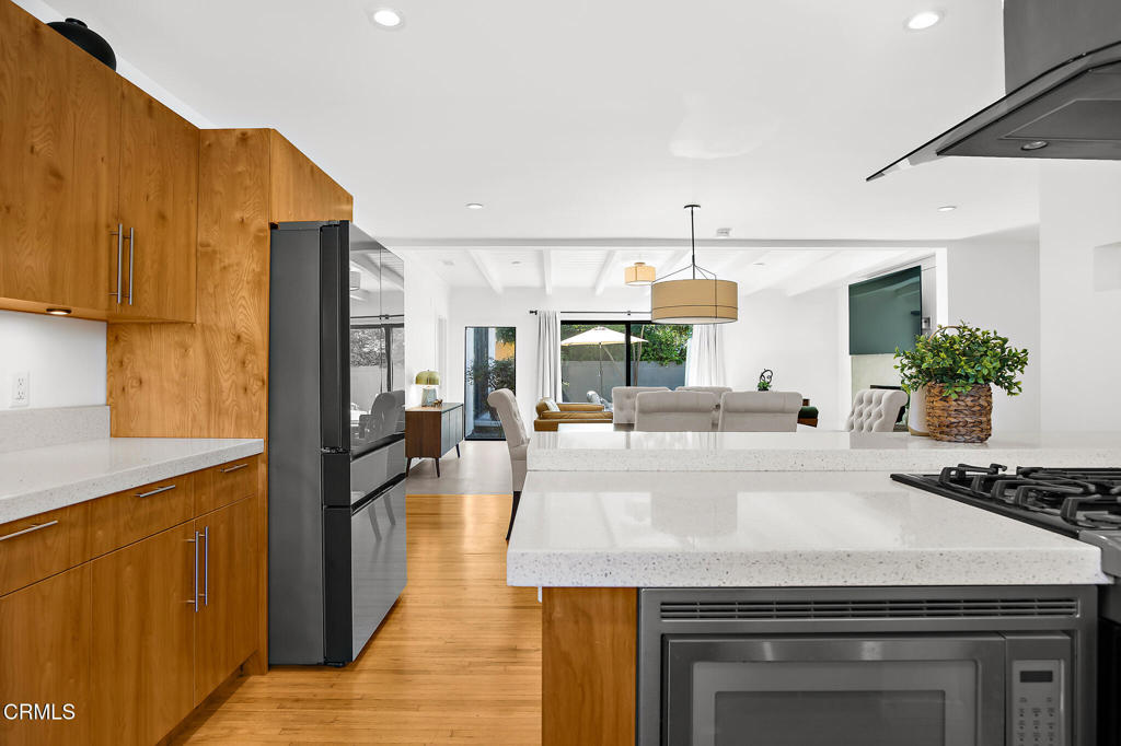 1881 Tulane Avenue Long Beach, CA 90815 - Photo 18 of 51 a kitchen with a stove and a refrigerator