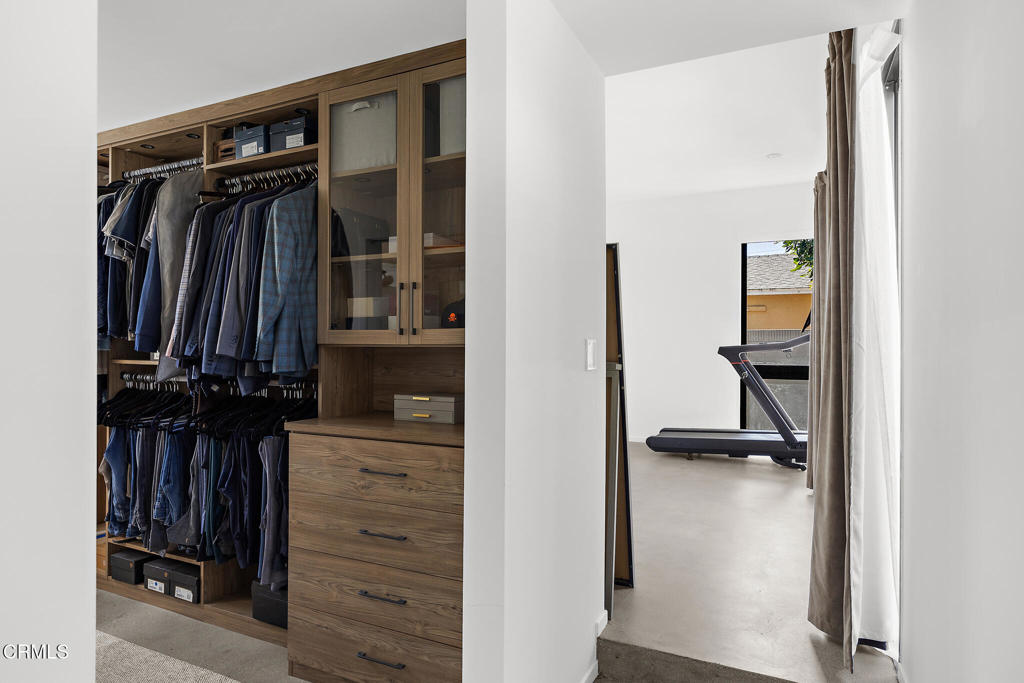 1881 Tulane Avenue Long Beach, CA 90815 - Photo 27 of 51 a view of walk in closet with clothes and shoes