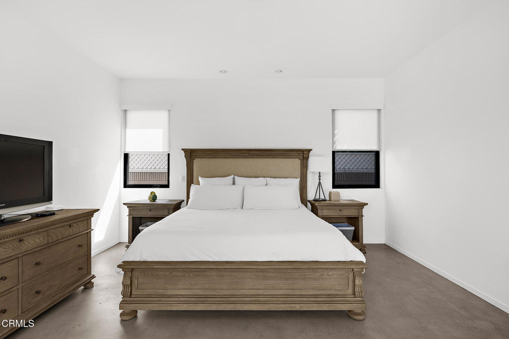 1881 Tulane Avenue Long Beach, CA 90815 - Photo 34 of 51 a bedroom with a bed and a flat screen tv