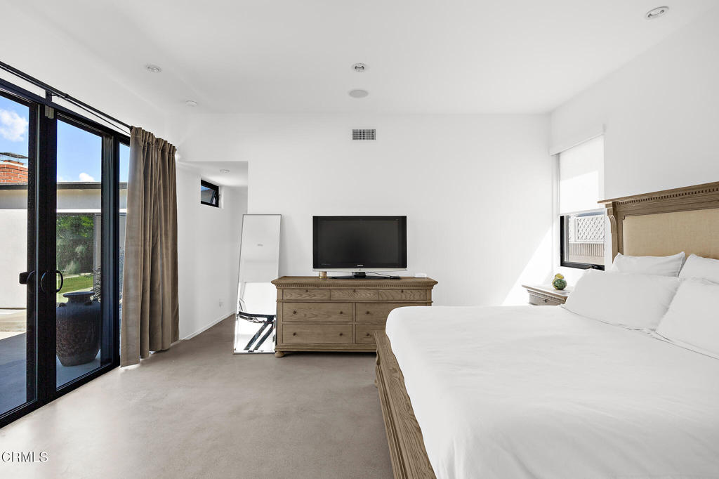 1881 Tulane Avenue Long Beach, CA 90815 - Photo 37 of 51 a bedroom with a bed and a flat screen tv