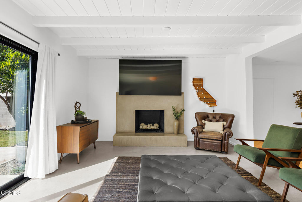 1881 Tulane Avenue Long Beach, CA 90815 - Photo 7 of 51 a living room with furniture and a fireplace