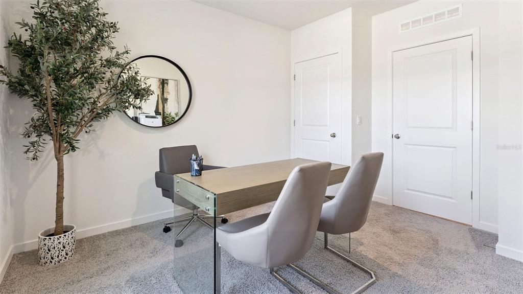 5276 Masser Road St. Cloud, FL 34772 - Photo 15 of 20 a view of a dining room with furniture