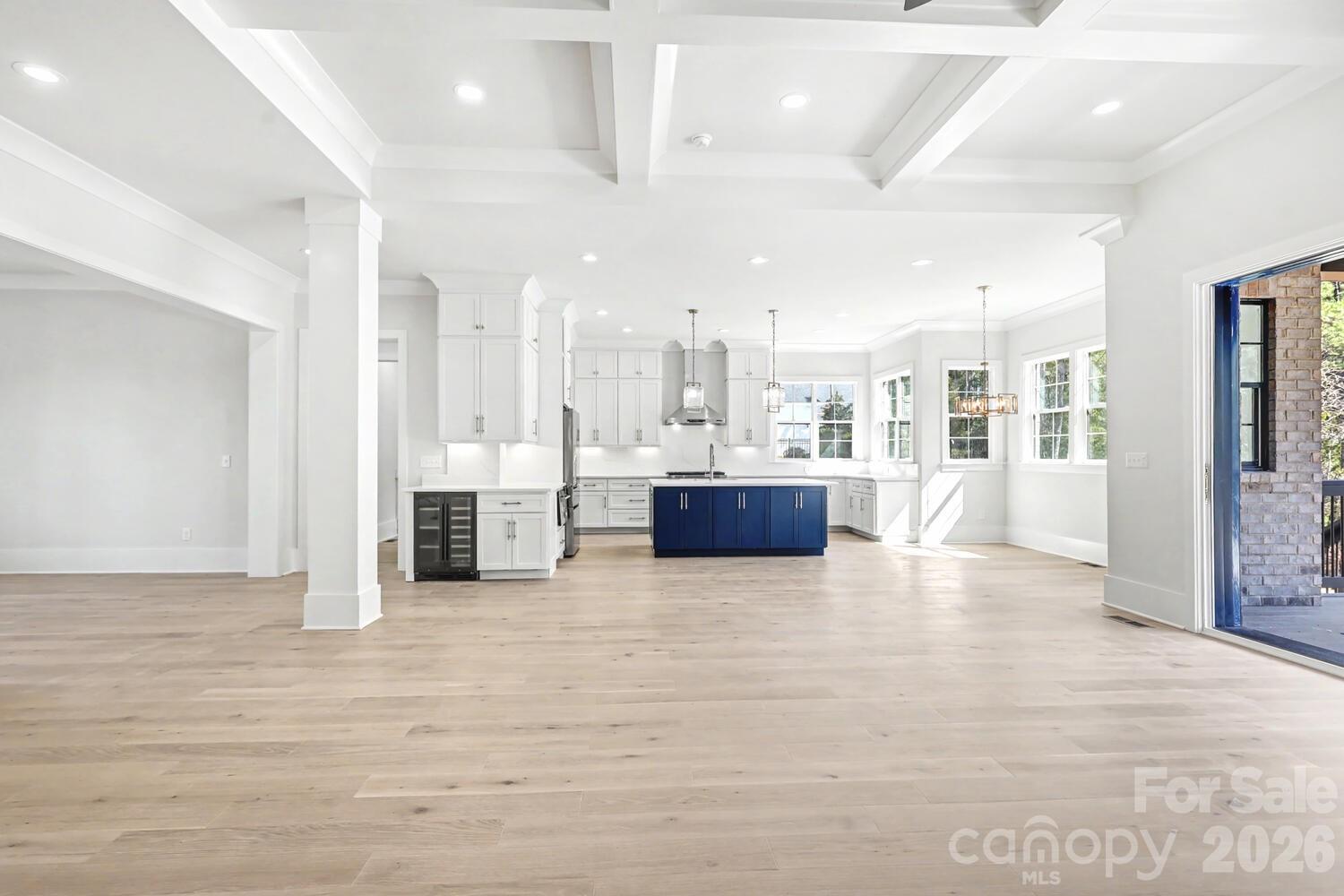 3210 Sherman Drive Lancaster, SC 29720 - Photo 11 of 44 a large hall with yard in front and white cabinets