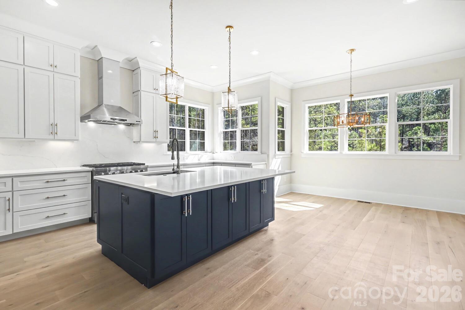 3210 Sherman Drive Lancaster, SC 29720 - Photo 14 of 44 a kitchen with stainless steel appliances granite countertop a sink and window