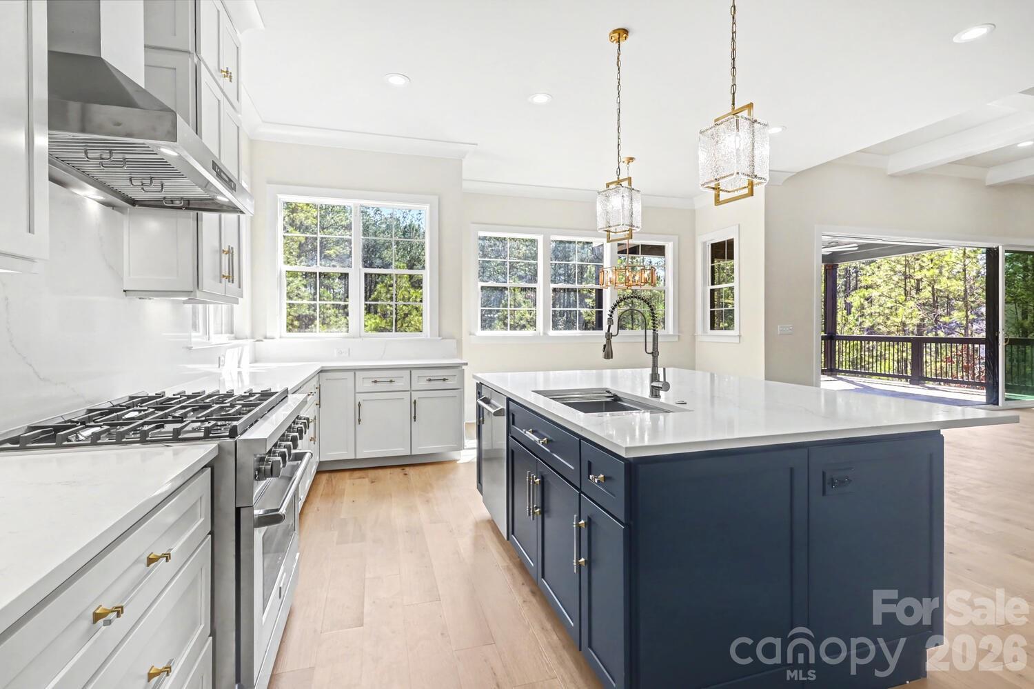3210 Sherman Drive Lancaster, SC 29720 - Photo 15 of 44 a kitchen with a sink stove and cabinets