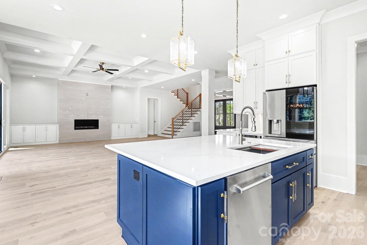 3210 Sherman Drive Lancaster, SC 29720 - Photo 16 of 44 a kitchen with a sink a counter top space and stainless steel appliances