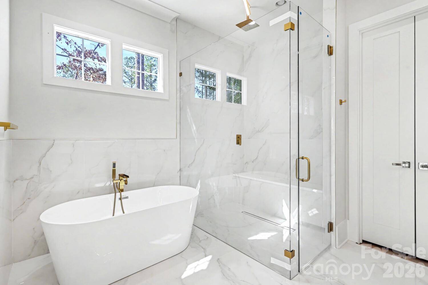 3210 Sherman Drive Lancaster, SC 29720 - Photo 25 of 44 a white bath tub sitting next to a shower