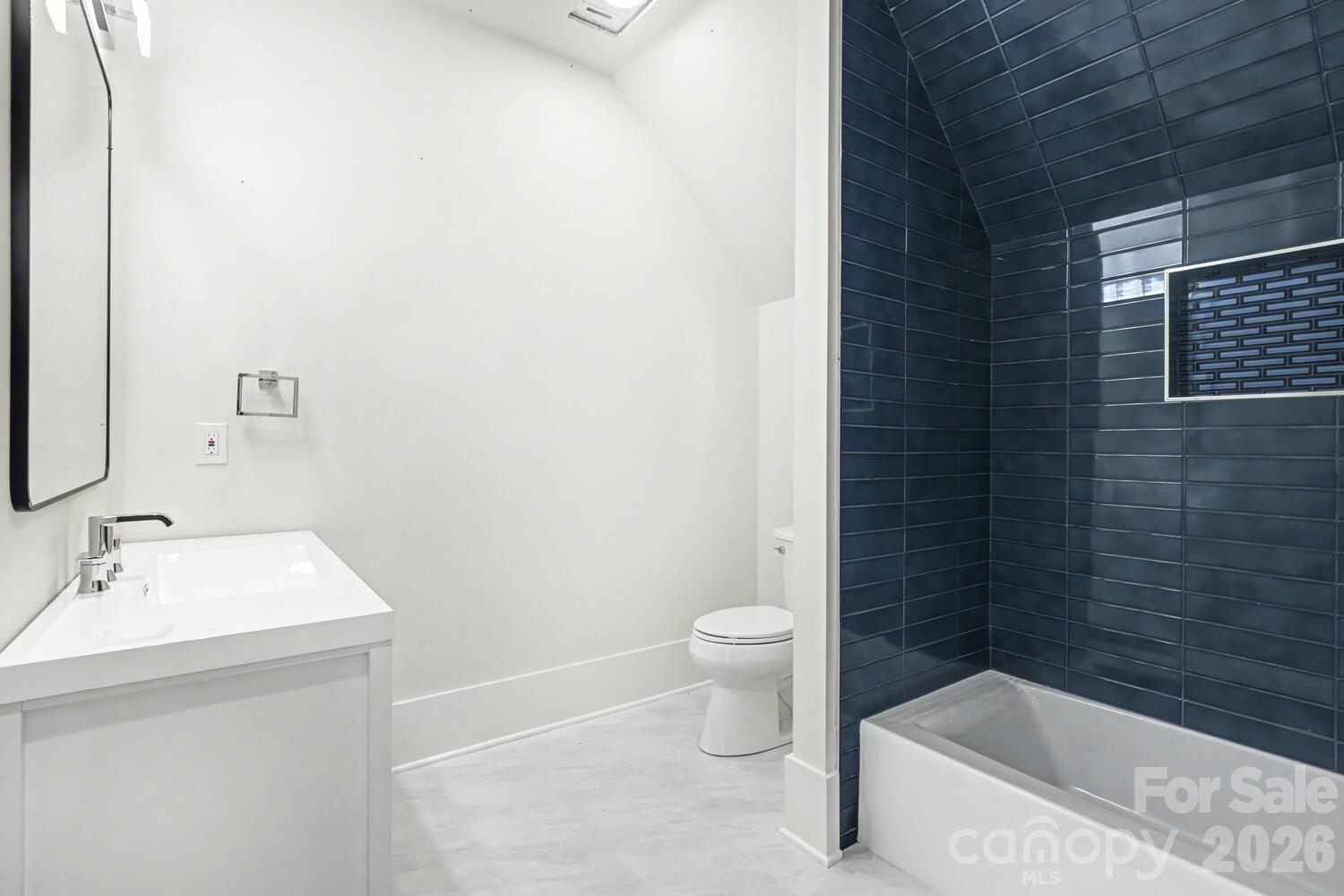 3210 Sherman Drive Lancaster, SC 29720 - Photo 34 of 44 a bathroom with a bathtub and sink